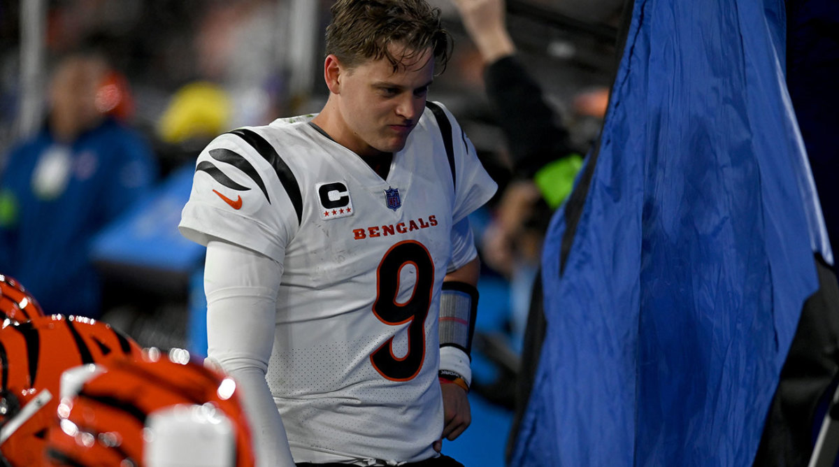 Joe Burrow on the sideline after injuring his wrist.